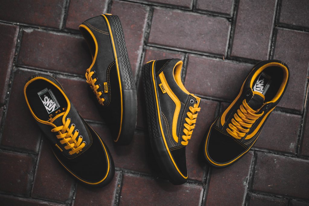 black vans yellow stripe