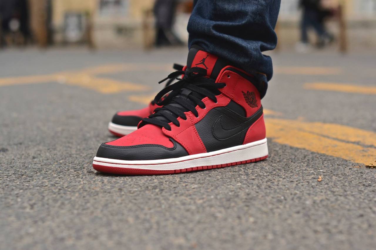 air jordan 1 mid gym red on feet